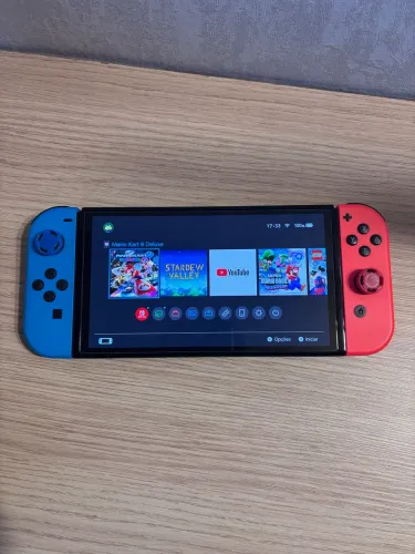 Nintendo Switch OLED + 2 Jogos