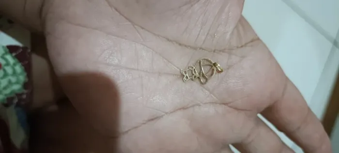 Pingente de menino de ouro