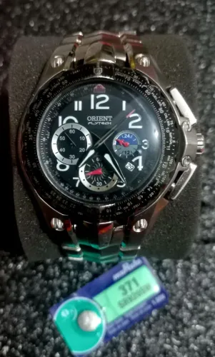 Relógio Orient Flytech , Original em Titanium , Bateria Nova e em Perfeito Estado