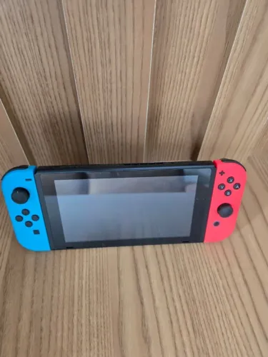 Nintendo Switch Clássico + Controle Pro + Case Traveler Deluxe