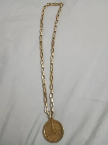 Vendo cordão prata com banho de ouro