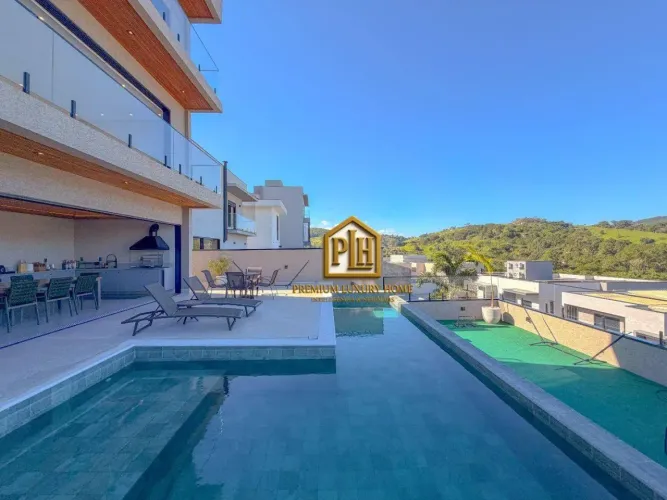 CASA COM 4 SUITES E UMA VISTA INCRIVEL EM CONDOMINIO FECHADO