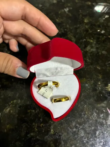 Aliança em moeda antiga