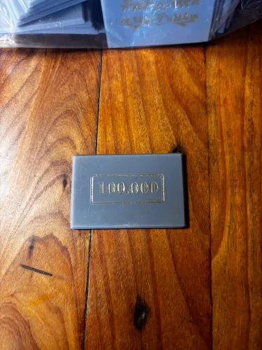 Fichas Cinzas (100.000)com 64,77 X 43,34 X 2,90 mm.