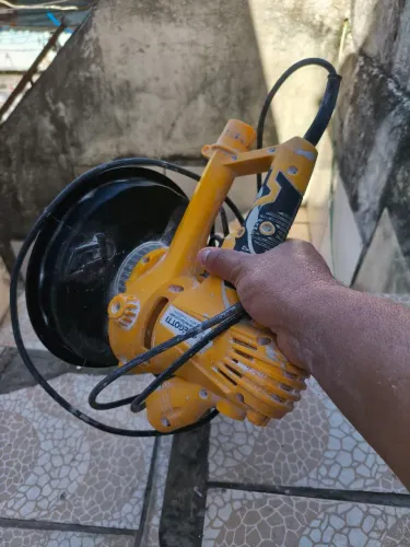 Máquina de lixar parede de mão