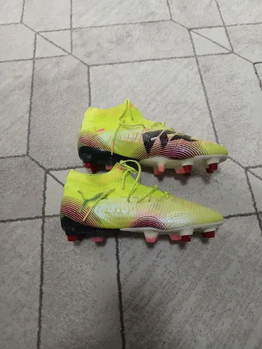 Chuteira Puma profissional 38 com travas avulsas