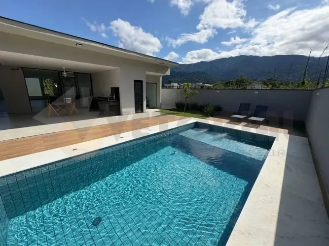 Casa com 3 dormitórios à venda, 225 m² por R$ 1.600.000,00 - Massaguaçu - Caraguatatuba/SP