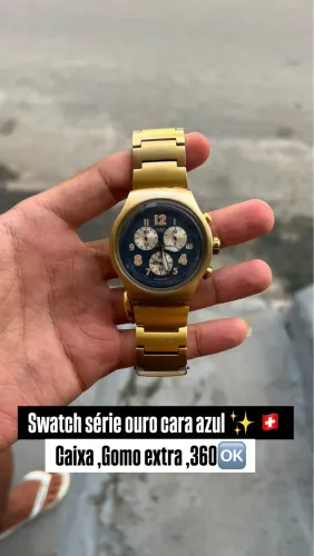 Swatch serie  ouro vara azul 