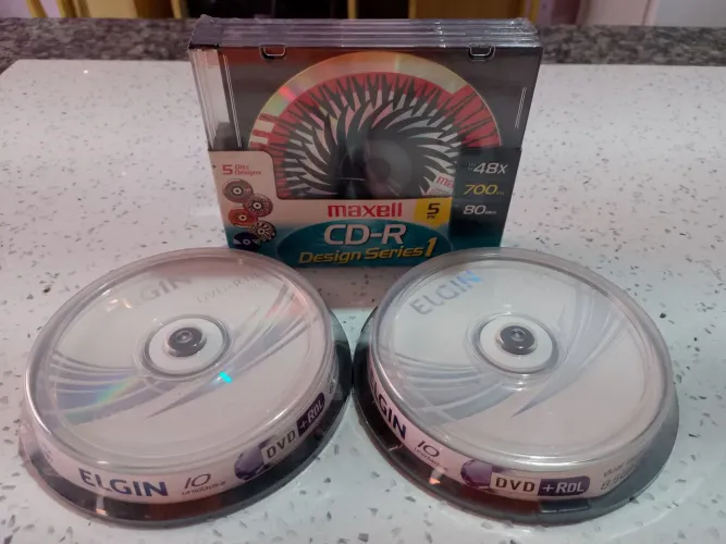3 packs CDS e DVDS virgens/lacrados/NOVOS(20 DVD+5 CD)