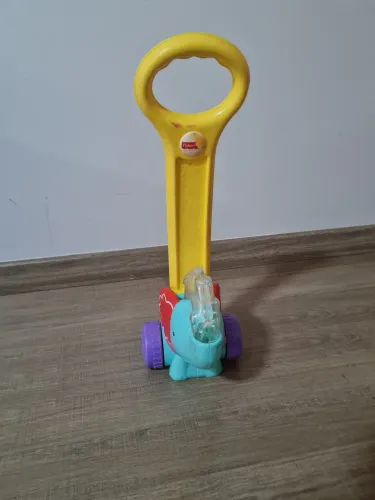 Elefantinho Fischer Price para auxílio a andar.  Com bolinhas que pulam ao andar