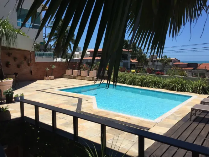 Casa com 3 pavimentos, vista para o mar e área de lazer