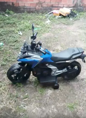 Moto elétrica infantil com som.