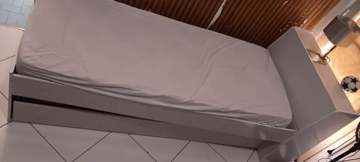 Cama de solteiro e fogão