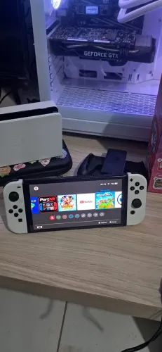 ? Nintendo Switch OLED Desbloqueado - Completo | 128GB | R$ 2.400,00