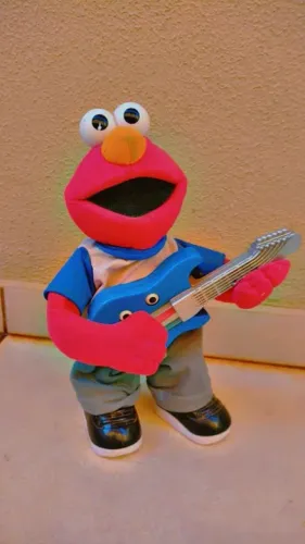 Boneco Elmo músical (((( raro toca música))