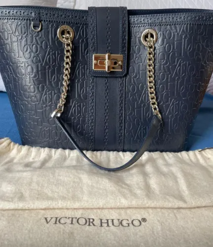 Bolsa original Victor Hugo,pouquíssimo uso/azul marinho/bag suporte :$900.00