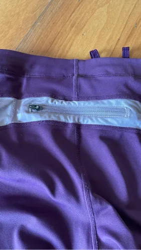 Legging asics roxa c zíper p cartão atrás . Em ótima conservação