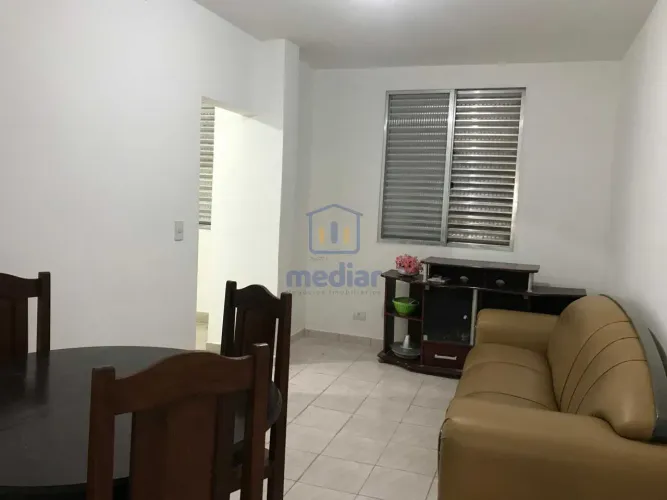Apartamento grande com 1 dormitório, em frente praia da Biquinha !
