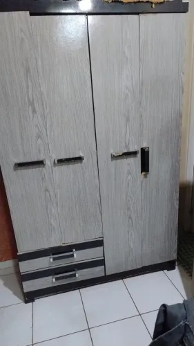 Doar guarda roupa usado