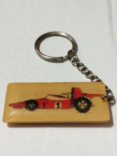 Chaveiro antigo carro fórmula 1 garagem Pop