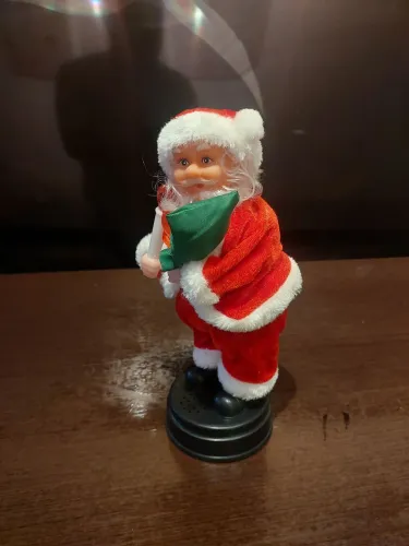Papai noel que toca música PROMOÇÃO 