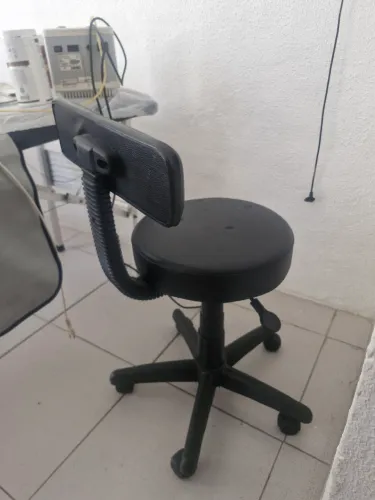 Cadeira hidráulica.