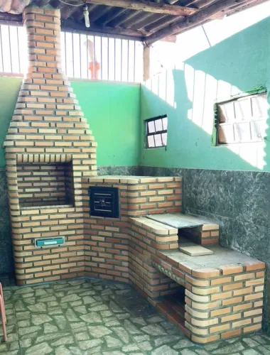 Fogão de lenha e churrasqueira de tijolinho