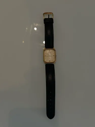 Relógio vintage Oriente quartz original pulseira couro banhado a ouro 