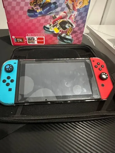 NINTENDO SWITCH SEMINOVO, IMPECÁVEL, NA GARANTIA ATÉ MÊS 07/2026