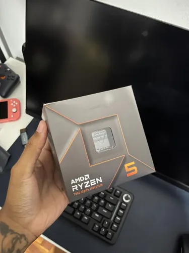 Processador Ryzen 5 7600 , com caixa e cooler original AMD