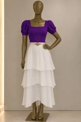 Blusa de tricô roxa com mangas bufantes
