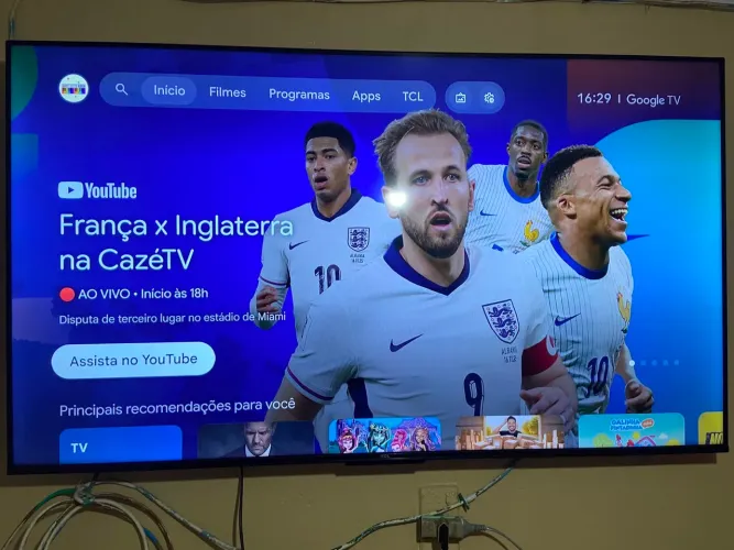 TV 55 pegadas TCL nova