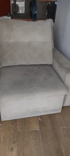 Sofá retrátil com marca de uso
