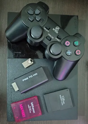 Playstation 2 Slim desbloqueado.