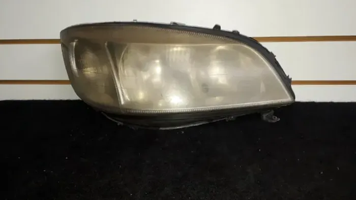 Zafira 10/11 Rh  Com detalhe garra e lente Amarelada.