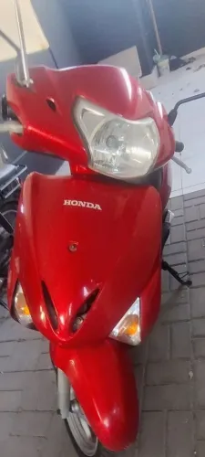 Honda 110 automática troco em celular topado