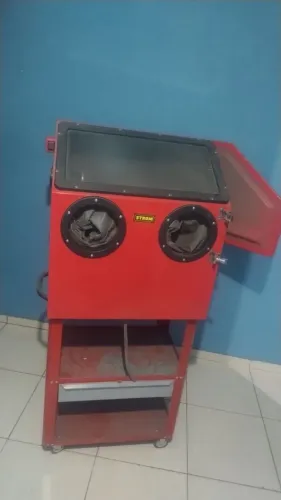 Máquina de jato de areia