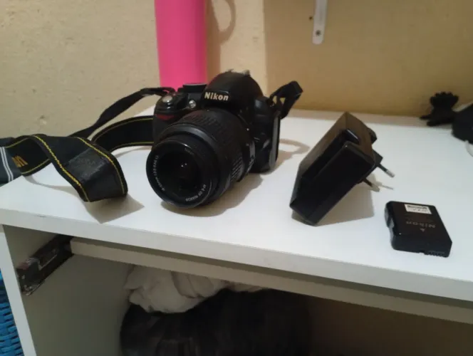 Vendo câmera Nikon D3100 ela está funcionando mas a bateria não tá carregando