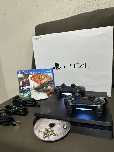Ps4 Slim 1Tera com Caixa dois controles+Jogos físicos e digitais!