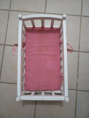 Berço de bonecas