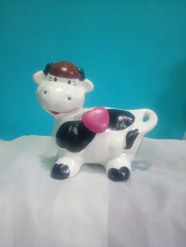 Vaquinha decorativa em cerâmica 
