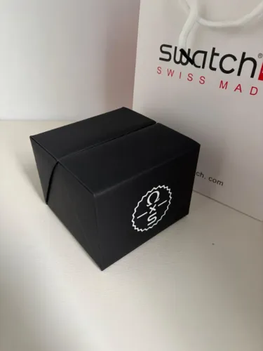 Caixa omega swatch preto