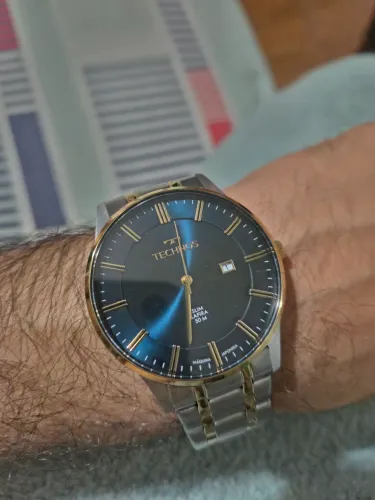 Relogio technos masculino prata com dourado GM10X/1A