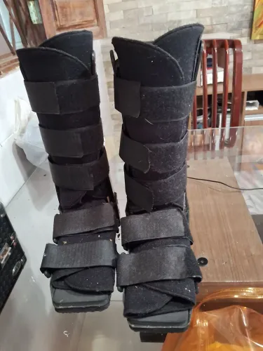 Bota cano alto, pois cirurgia 