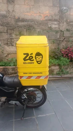 Vendo bau de moto  144 litros do ze delivery, ja vem com o suporte e com o trilho.