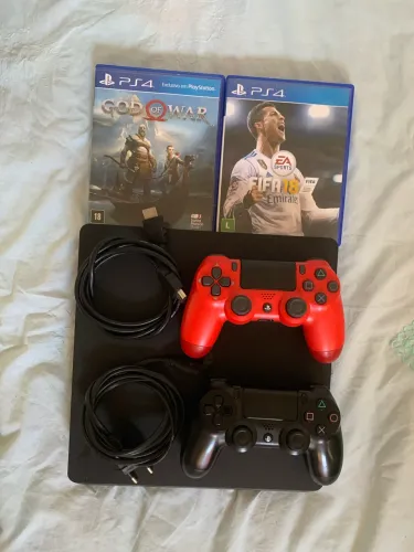 Vendo ps4 slim 500 gb com 2 controles