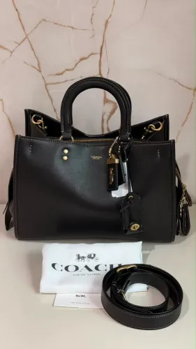 Bolsa Coach rogue 31