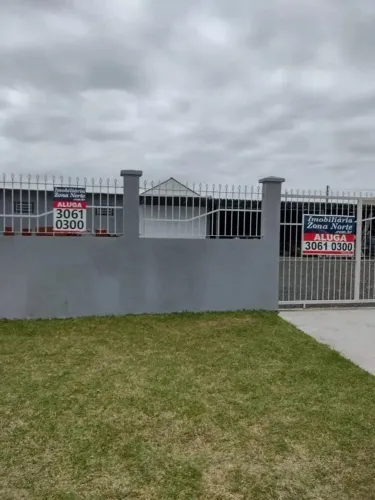 TERRENO c/aprox. 550m², com área contruída de 200m² NOVA! Prédio com amplo depósito/salão,