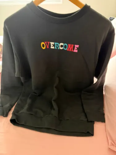 Blusa overcome
