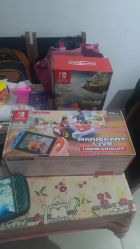 Kit Nintendo Switch + Mario Kart Home Live + 2 jogos, avalio trocas.